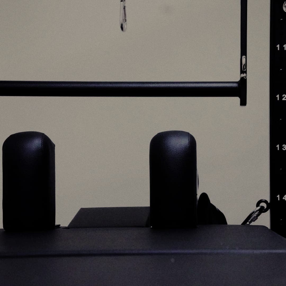 Pilates tower with push-through bar in The Den studio