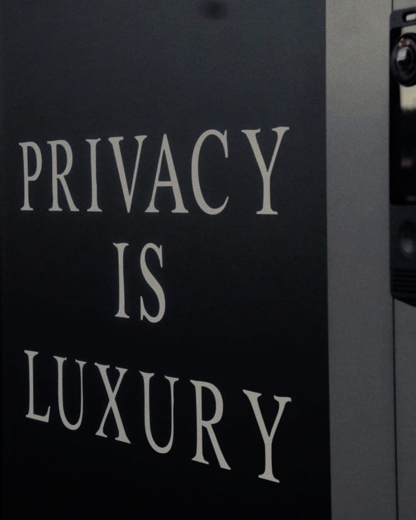 Privacy Is Luxury lettering beside the secure keyless entry at The Den